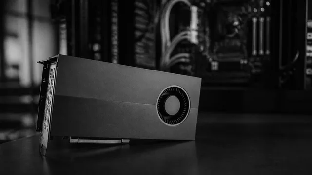 Intel Arc Pro B70 graphics card displayed from the side, showing its blue exterior, yellow memory modules, and cooling fins…