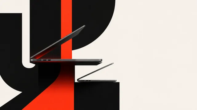 A sleek MacBook displaying a vibrant, colorful abstract design on its screen against a gradient blue and gold background…