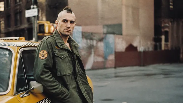 Man in aviator sunglasses and military jacket with yellow arrow pointing to "We Are The People" badge, with "THE DEEPER…